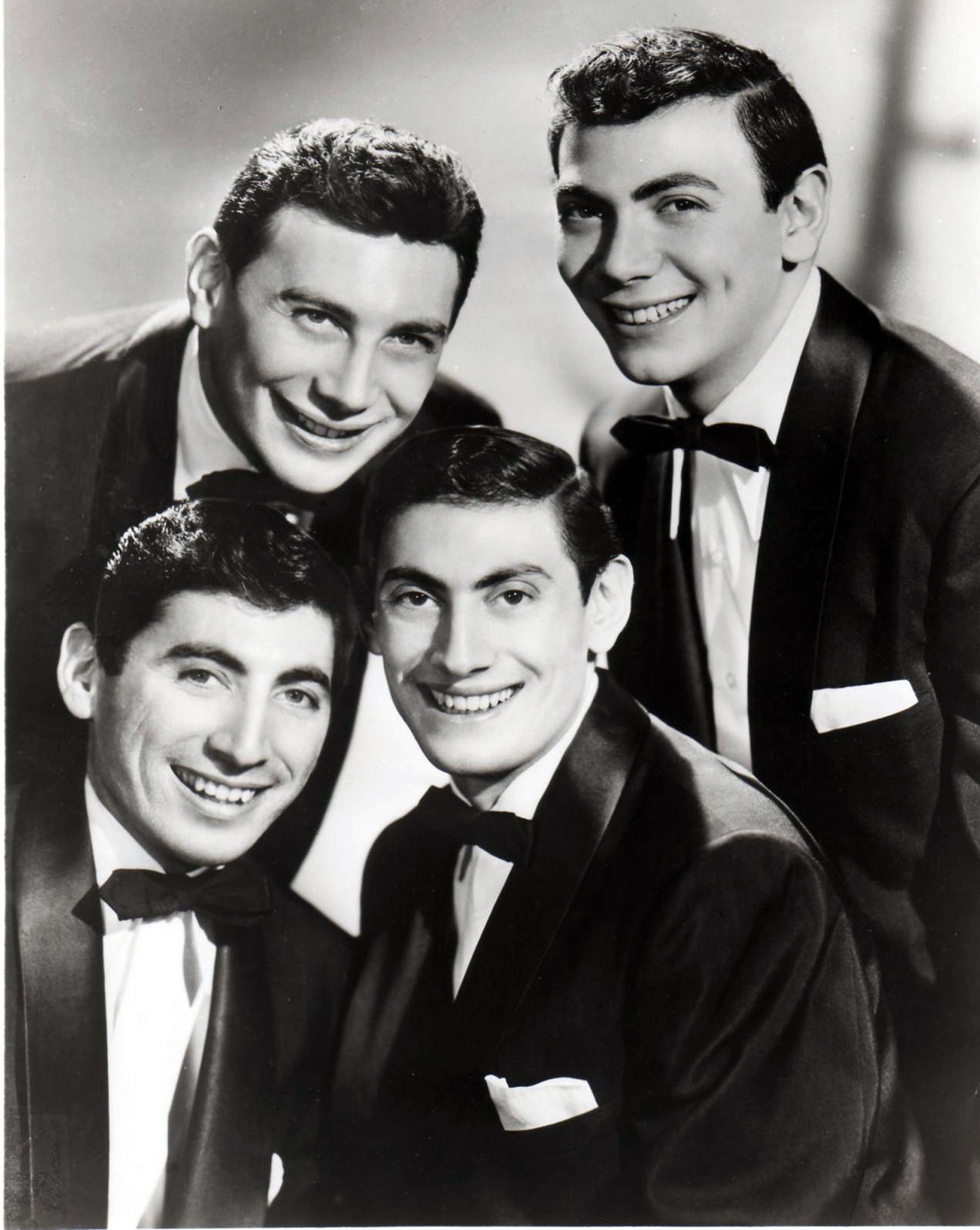 This image provided by Karen Mesterton-Gibbons shows The Ames brothers posing during an appearance for CBS Radio in the 1950s. Shown, from bottom left, Gene Ames; above left, Joe Ames; above right, Ed Ames; below right, Vic Ames.  