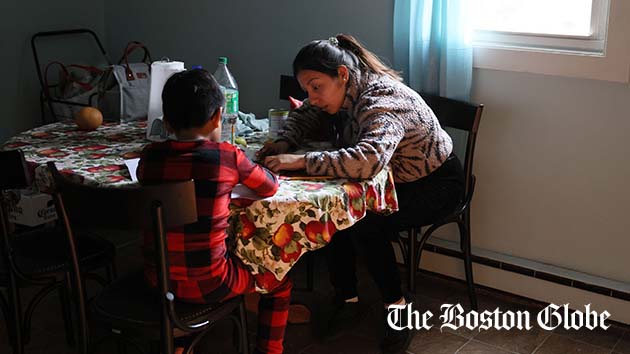 Vicky, who arrived recently from Peru, helped her son with his English homework inside the family’s rented two-bedroom apartment in Chelsea.
