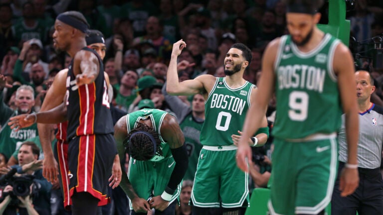 Robert Williams, Jayson Tatum, and Derrick White disagree with a first half call that didn't go Boston's way.