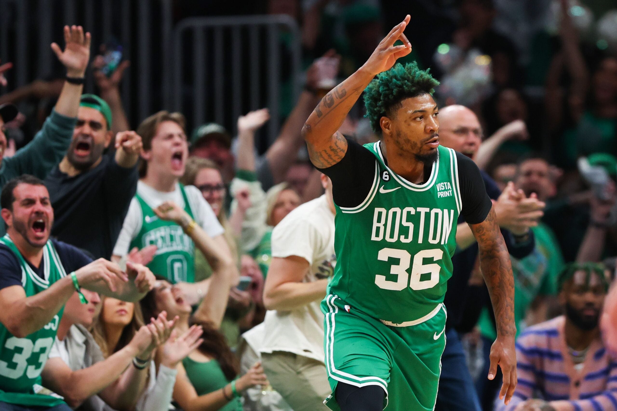 Marcus Smart #36 of the Boston Celtics reacts against the Miami Heat during the first quarter