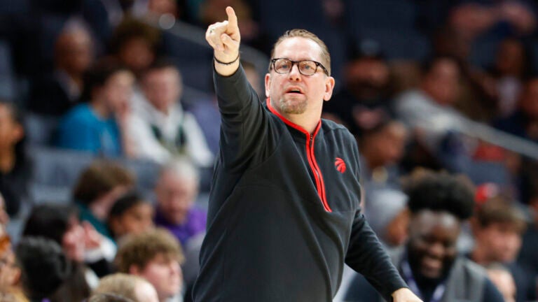 Toronto Raptors head coach Nick Nurse directs his team during the first half of an NBA basketball game against the Charlotte Hornets.