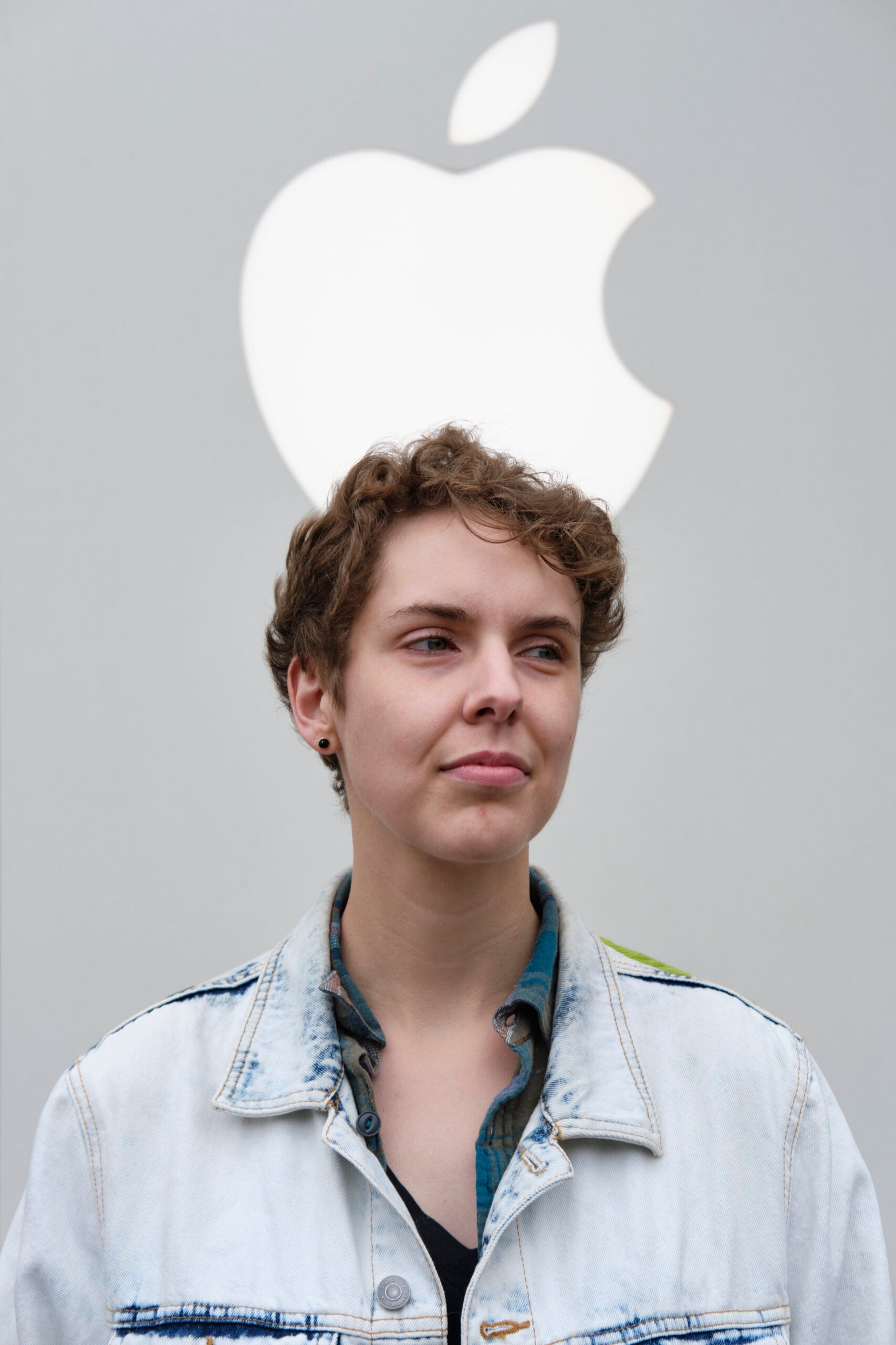 Gemma Wyatt stands outside the Apple Store in the Country Club Plaza shopping mall in Kansas City, Missouri.