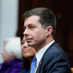 Transportation Secretary Pete Buttigieg attends a meeting with President Joe Biden's "Investing in America Cabinet," in the Roosevelt Room of the White House, Friday, May 5, 2023, in Washington.