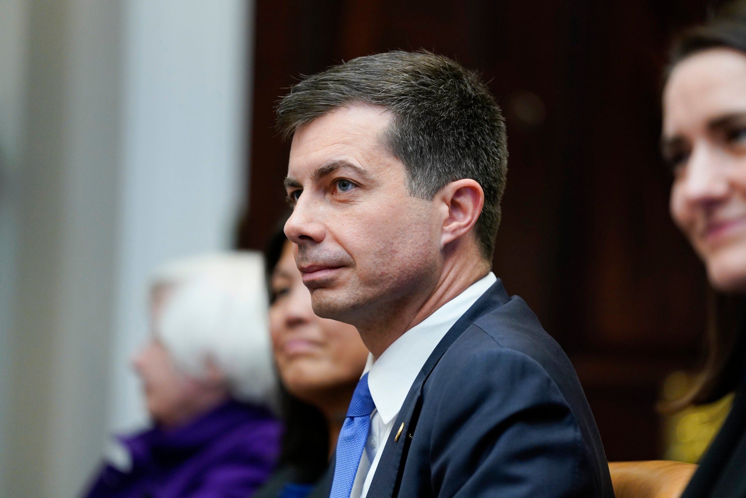 Transportation Secretary Pete Buttigieg attends a meeting with President Joe Biden's "Investing in America Cabinet," in the Roosevelt Room of the White House, Friday, May 5, 2023, in Washington.