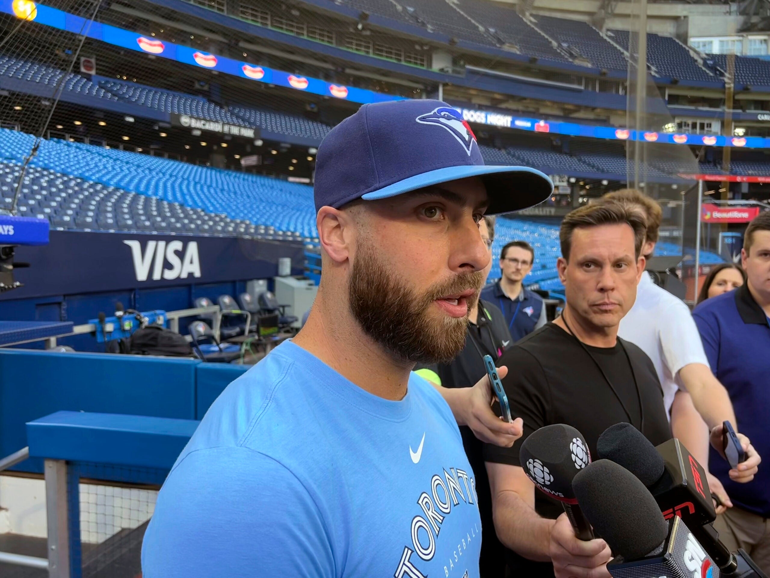 Toronto Blue Jays relief pitcher Anthony Bass gives a statement to media ahead baseball game against the Milwaukee Brewers in Toronto on Tuesday.