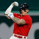 Jarren Duran of the Red Sox reacts after hitting an RBI double.