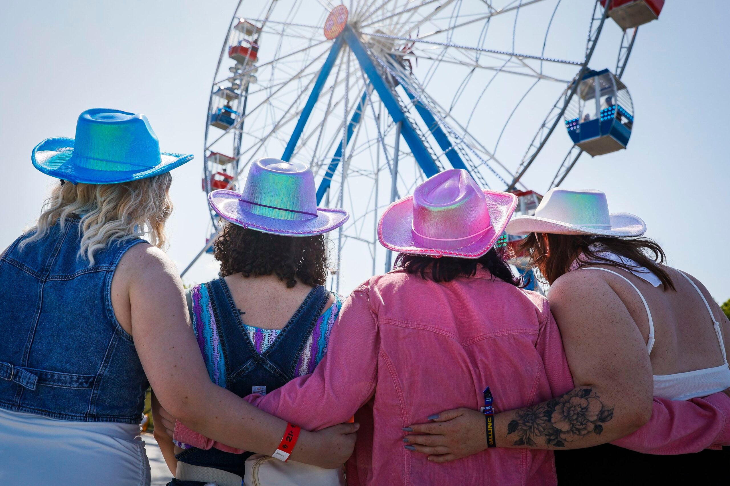 Chloe Patch, Kaitlyn Sass, Kaleigh Wandell, and Delaney Diaz sport cowgirl hats while attending Boston Calling on Friday.