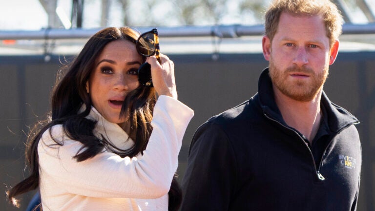 Prince Harry and Meghan Markle, Duke and Duchess of Sussex, visit the track and field events at the Invictus Games in The Hague, Netherlands, Sunday, April 17, 2022.