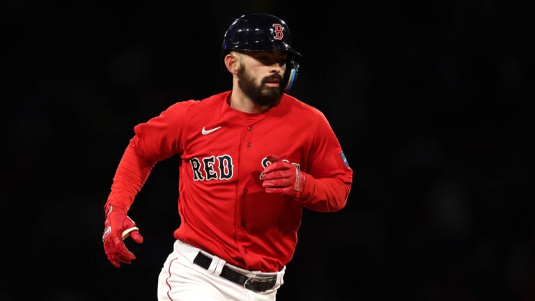 Boston Red Sox catcher Connor Wong and teammates congratulate each