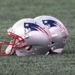 The New England Patriots logo is seen on helmets before the NFL football game between the New England Patriots and the Dallas Cowboys at Gillette Stadium, Sunday, Oct. 17, 2021 in Foxborough, Mass.