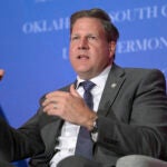 New Hampshire Governor Chris Sununu speaks at a convention.