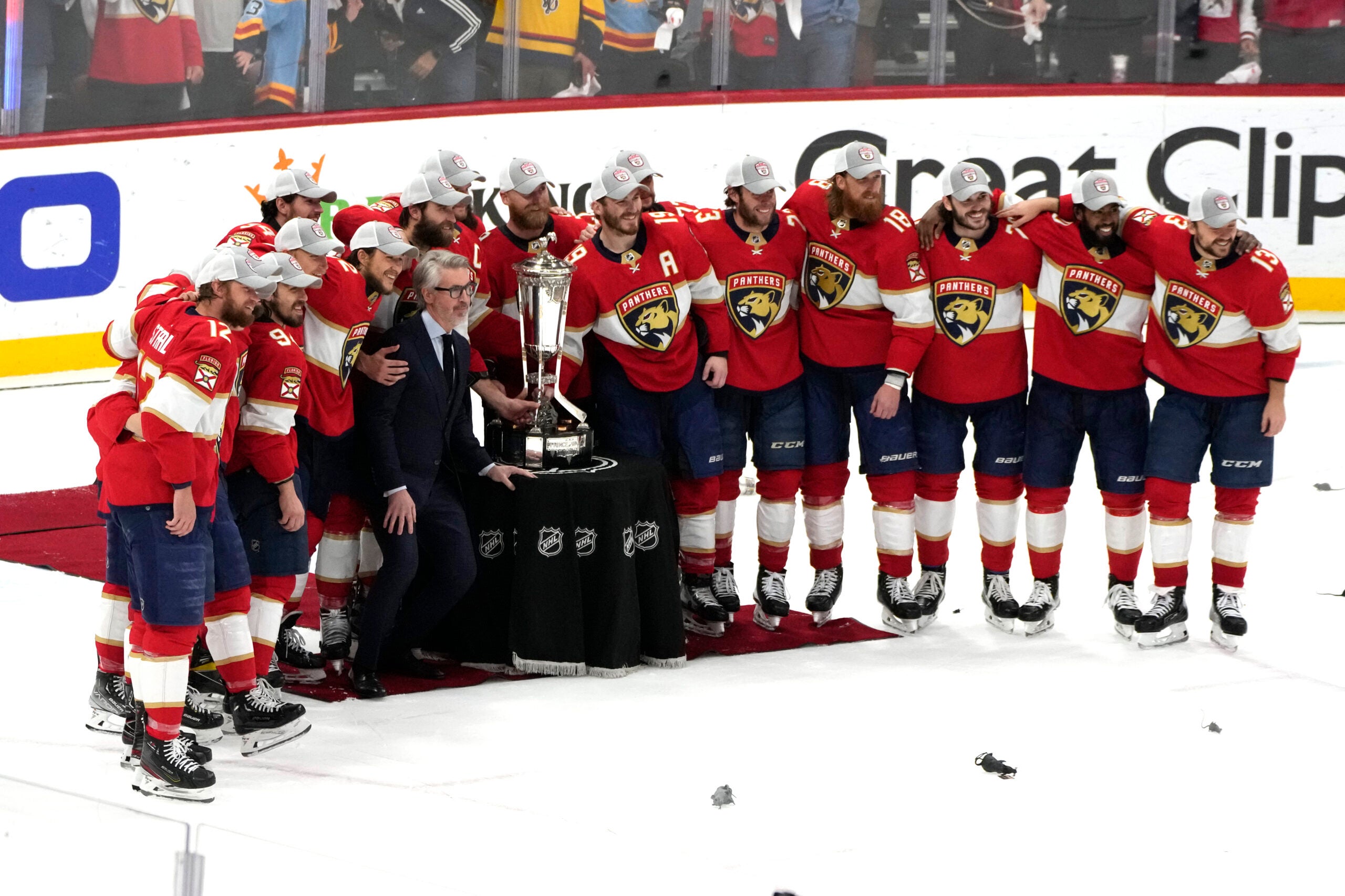 The Florida Panthers pose with the Prince of Wales trophy after winning Game 4 of the NHL hockey Stanley Cup Eastern Conference finals against the Carolina Hurricanes.