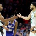 Al Horford #42 and Jayson Tatum #0 of the Boston Celtics celebrate after defeating the Philadelphia 76ers in game six in the Eastern Conference Semifinals in the 2023 NBA Playoffs at Wells Fargo Center on May 11, 2023 in Philadelphia, Pennsylvania.