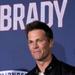 NFL quarterback Tom Brady, a cast member and producer of "80 for Brady," poses at the premiere of the film, Tuesday, Jan. 31, 2023, at the Regency Village Theatre in Los Angeles.