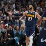 Denver Nuggets guard Jamal Murray (27) celebrates a three pointer against the Los Angeles Lakers.