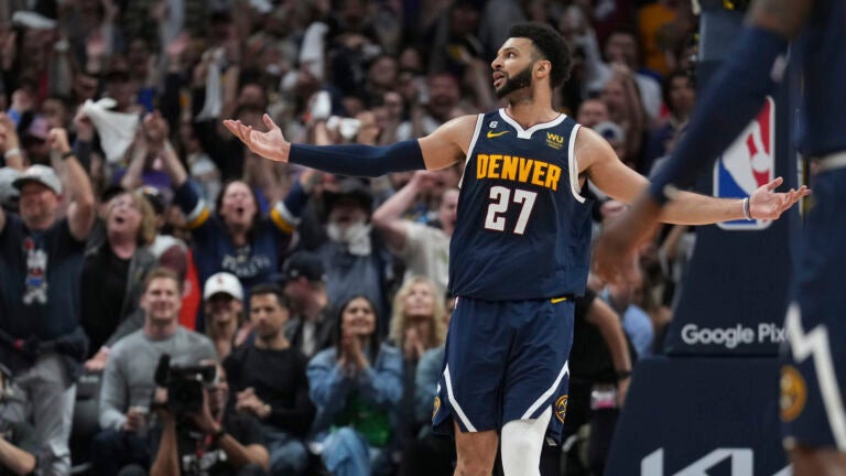 Denver Nuggets guard Jamal Murray (27) celebrates a three pointer against the Los Angeles Lakers.