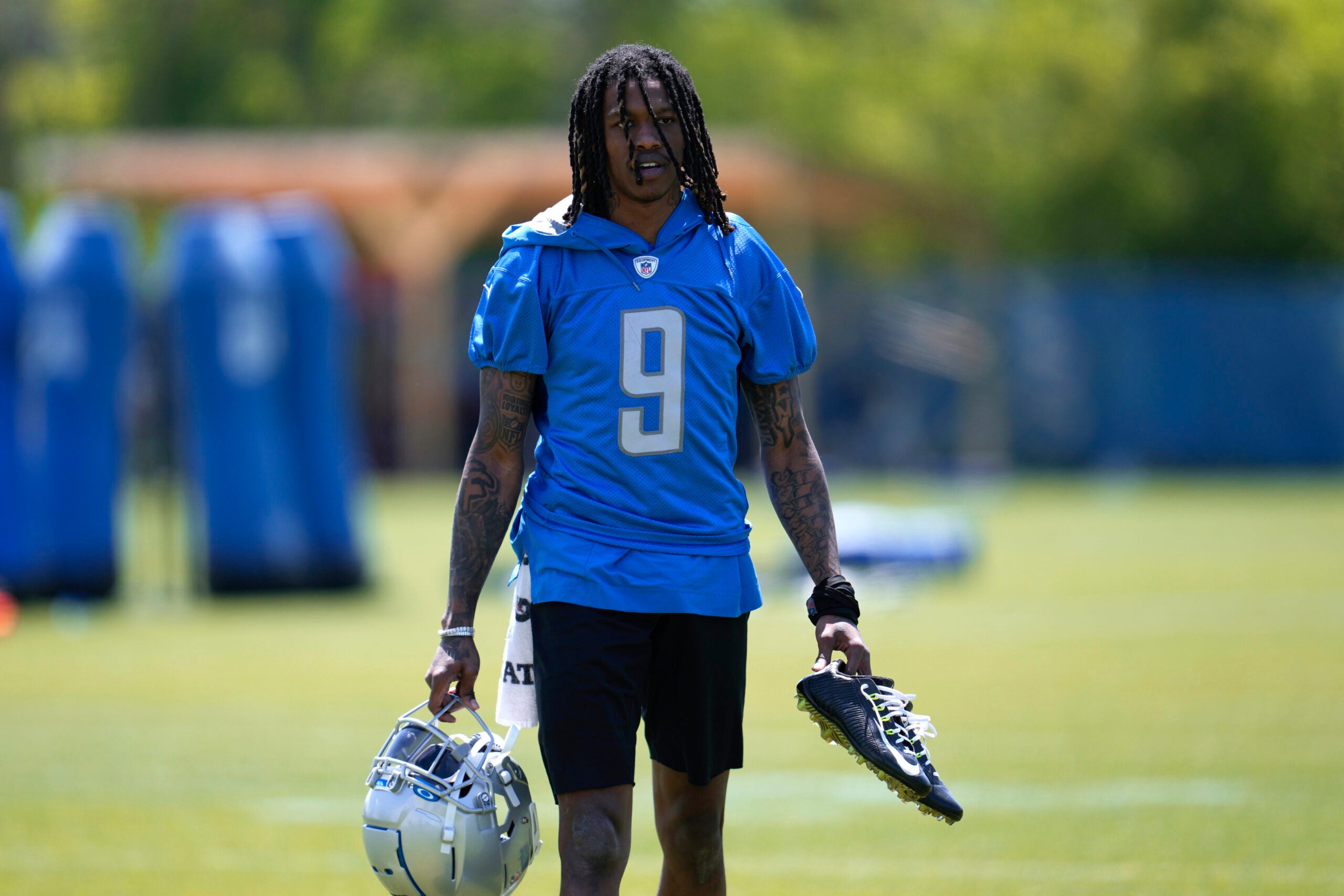 Detroit Lions wide receiver Jameson Williams (9) walks off the field after an NFL football practice.