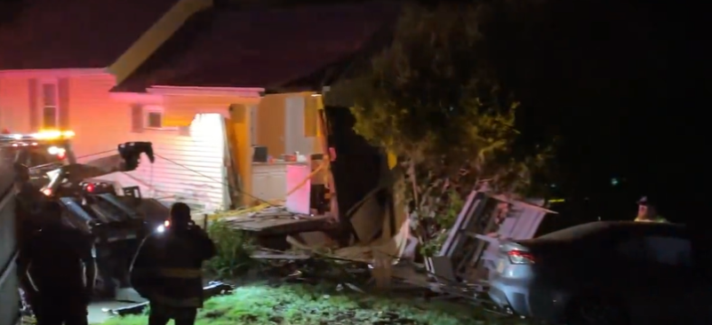 A damaged car that drove through a Marlborough home