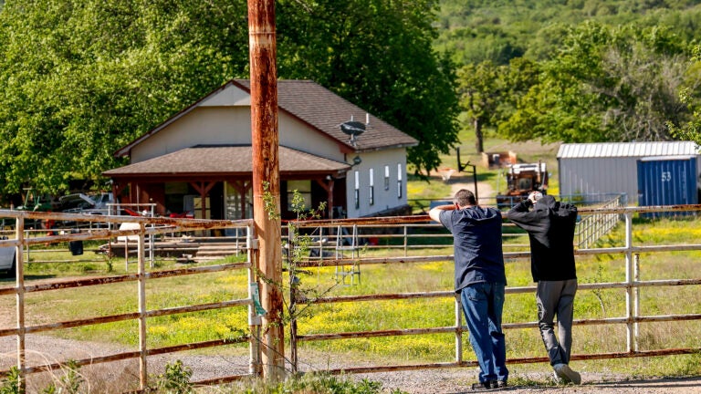 Justin and Haydon Webster, the father and brother of Ivy Webster who was found dead Monday, visit the site where Ivy's body was found in Henryetta, Oklahoma, Tuesday, May 2, 2023.