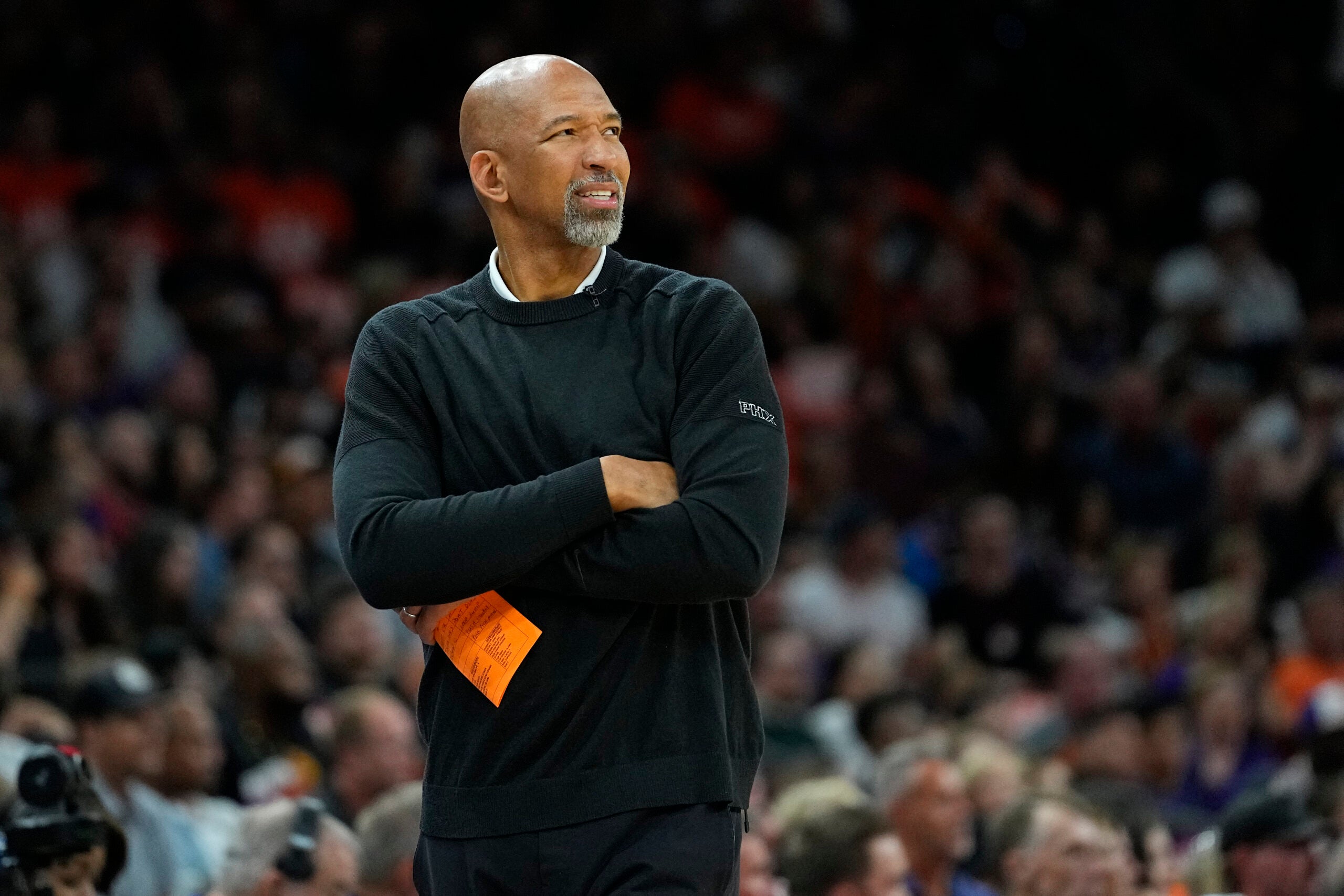 Phoenix Suns head coach Monty Williams watches during the first half of Game 6 of an NBA basketball Western Conference semifinal game.