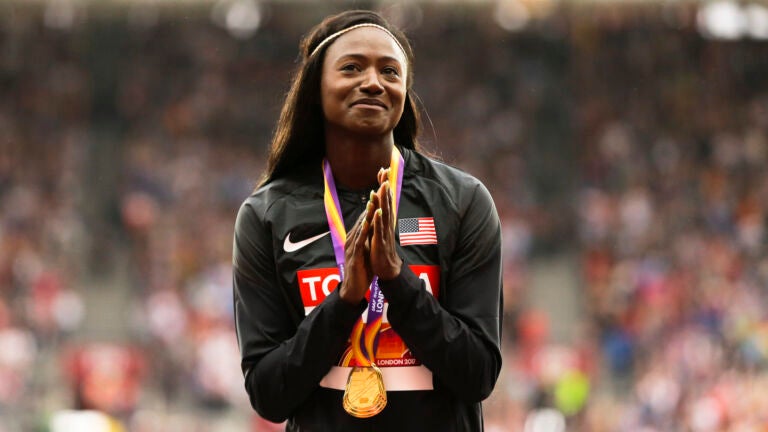 United States' Tori Bowie gestures after receiving the gold medal she won in the women's 100-meter final during the World Athletics Championships in London, Monday, Aug. 7, 2017.