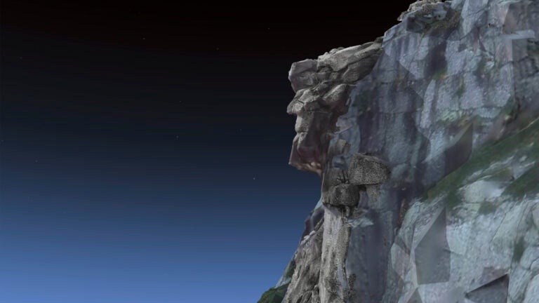 In this image taken on April 28, 2023, in Hanover, New Hampshire, an interactive 3D model of the state's Old Man of the Mountain is shown back on Cannon Cliff in Franconia Notch.
