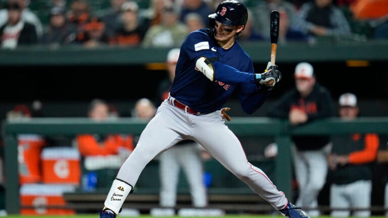 Red Sox outfielder Jarren Duran takes a swing in a game against the Orioles.