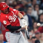 Cincinnati's Spencer Steer connects for a two-run home run during the seventh inning.