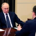 Russian President Vladimir Putin listens to the Governor of the Nizhny Novgorod Region, Gleb Nikitin, during their meeting at the Novo-Ogaryovo residence outside Moscow, Russia.