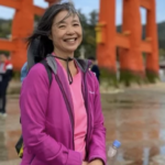 Patricia Wu-Murad in a pink shirt and pink jacket.
