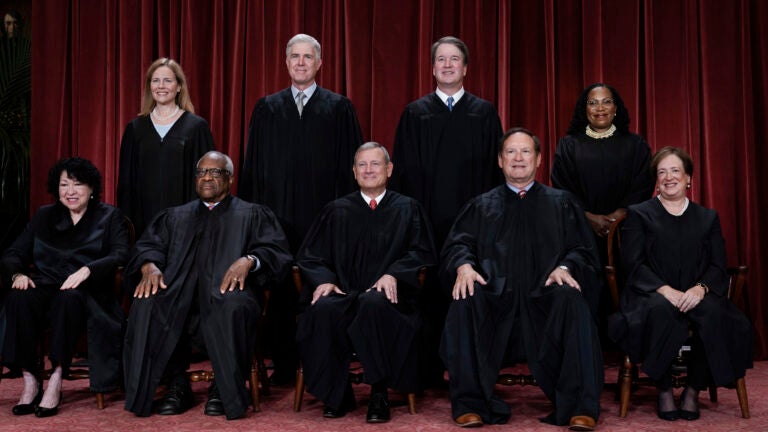 Members of the Supreme Court sit for a new group portrait following the addition of Associate Justice Ketanji Brown Jackson, at the Supreme Court building in Washington, Oct. 7, 2022. Bottom row, from left, Associate Justice Sonia Sotomayor, Associate Justice Clarence Thomas, Chief Justice of the United States John Roberts, Associate Justice Samuel Alito, and Associate Justice Elena Kagan. Top row, from left, Associate Justice Amy Coney Barrett, Associate Justice Neil Gorsuch, Associate Justice Brett Kavanaugh, and Associate Justice Ketanji Brown Jackson.