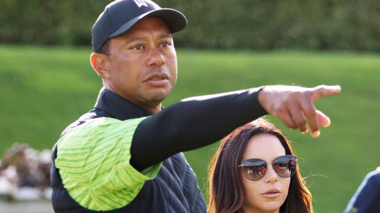 Tiger Woods and girlfriend Erica Herman.