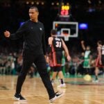 Head coach Joe Mazzulla of the Boston Celtics walks on the court during the first quarter in game seven of the Eastern Conference Finals against the Miami Heat at TD Garden on May 29, 2023 in Boston, Massachusetts.