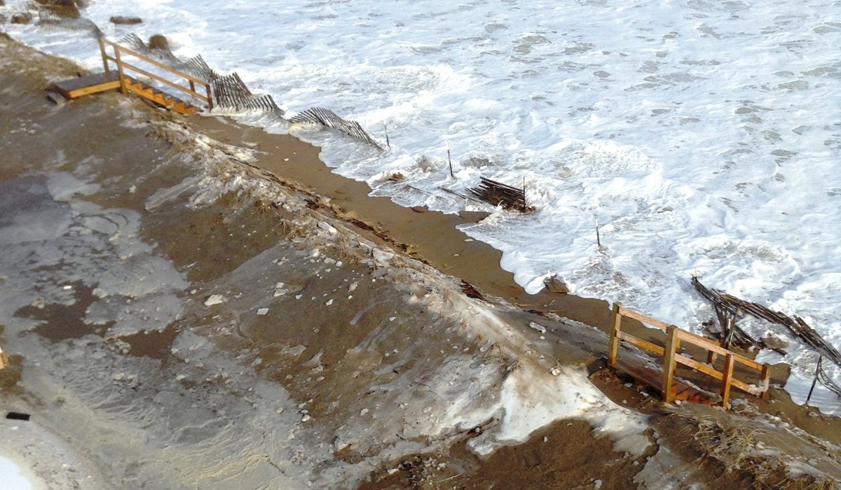 Waves crash into an eroded Salisbury Beach