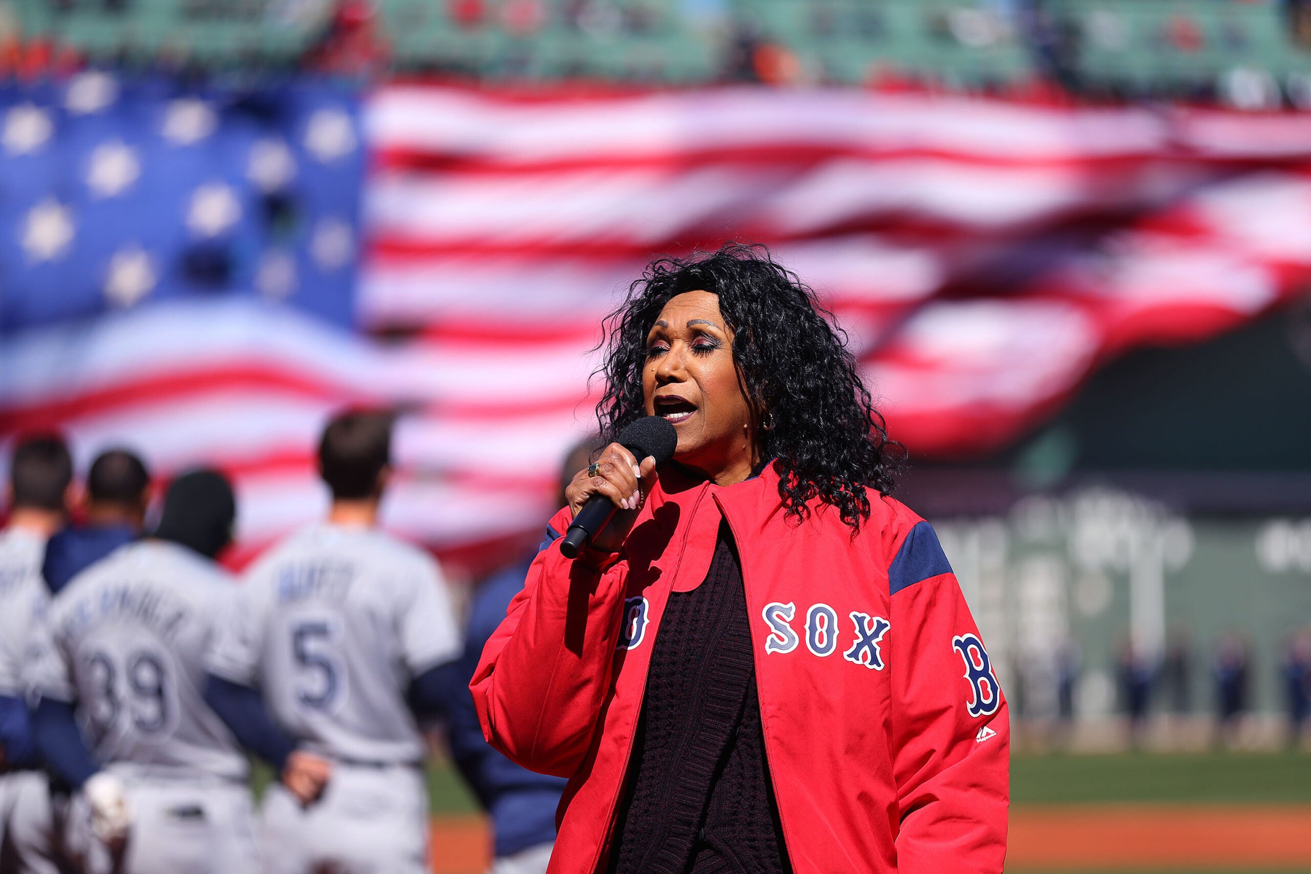 Ruth Pointer of the Pointer Sisters sings the National Anthem at the Red Sox home opener in 2018.  