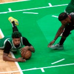 Celtics guard Marcus Smart (36) dives on a loose ball during the first quarter. The Boston Celtics host the Miami Heat in Game 5 of the NBA Eastern Conference Finals on May 25, 2023 at TD Garden in Boston, MA.
