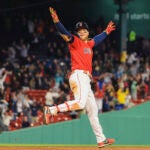 Boston Red Sox right fielder Alex Verdugo (99) celebrates his walk off home run against the Toronto Blue Jays during ninth inning MLB action at Fenway Park.
