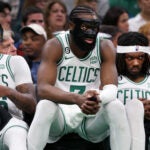 Boston, MA: Celtics starters (left to right) Marcus Smart, Jaylen Brown and Robert Williams are pictured on the bench in the thirde quarter. The Boston Celtics hosted the Miami Heat for Game One of their NBA Eastern Conferencene Finals series at the TD Garden.