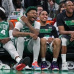 The Celtics can be seen enjoying themselves on the bench during Game 2.