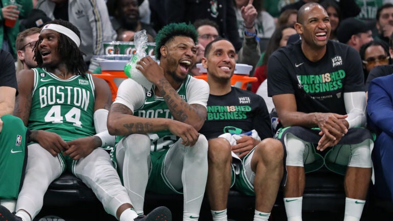 The Celtics can be seen enjoying themselves on the bench during Game 2.