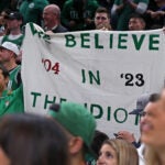 05-25-23: Boston, MA: Late in the game some fans held up a sign linking the 2004 Boston Red Sox down three games to none comeback against the Yankees to this year's Celtics. The Boston Celtics hosted the Miami Heat for Game Five of their NBA Eastern Conference Championship series at the TD Garden.