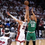 The Celtics Grant Williams hit this three pointer over Miami's Max Strus to give Boston an 88-77 lead in the third quarter. Boston Celtics visited the Miami Heat for Game Four of their NBA Eastern Conference Finals series at the Kaseya Center.
