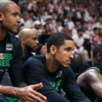 05-21-23: Miami, FL: The Celtics (left to right) Al Horford, Malcolm Brogdon and Robert Williams are pictured on the bench midway through the second quarter as the Heat built on their lead. The Boston Celtics visited the Miami Heat for Game Three of their NBA Eastern Conference Finals series at the Kaseya Center.