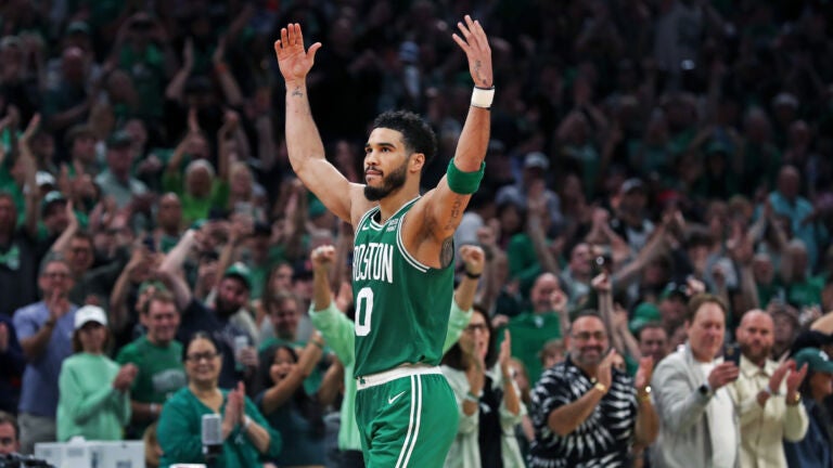 The Celtics Jayson Tatum acknowledges and encourages the cheeres of the crowd as he leaves the game in the fourth quarter, having scored 51 points in the game. The Boston Celtics hosted the Philadelphia 76ers for Game Seven of their NBA Eastern Conference Semi Final basketball series at the TD Garden.