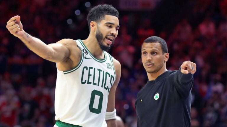 Jayson Tatum (left) and Joe Mazzulla (right) on the sidelines for Game 6 between the Celtics and 76ers.