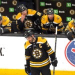 A dejected Boston Bruins center Patrice Bergeron (37) skates away from the Bruins bench at the end of the game losing in overtime.