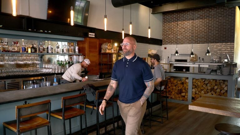 Restaurateur Daniel Roughan, the owner of Source is Harvard Square, has paused his search for a spot to open a restaurant in Boston, citing the high cost of a liquor license.