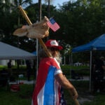 A supporter of former President Donald Trump protests outside the Wilkie D. Ferguson Jr. U.S. Courthouse in Miami on Tuesday morning, June 13, 2023