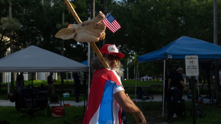 A supporter of former President Donald Trump protests outside the Wilkie D. Ferguson Jr. U.S. Courthouse in Miami on Tuesday morning, June 13, 2023