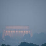 Haze blankets the Lincoln Memorial on the National Mall in Washington.